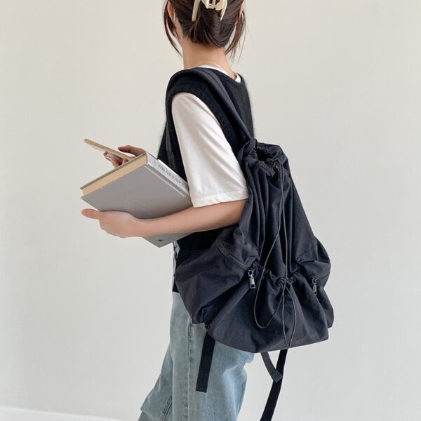 women's dark blue drawstring nylon backpack